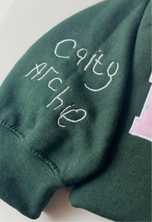 Child’s Handwriting on Sleeve
